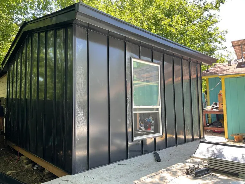 Black standing seam metal wall panels for Roof Inspection in Picnic Point