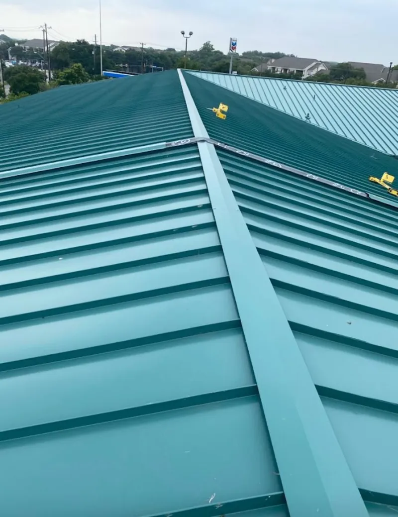 Green commercial metal roof ridge and valley for Metal Roof Repair in Picnic Point